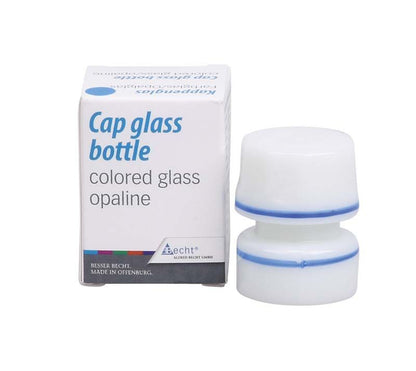 Kappenglas aus Opalglas mit blauem Ring neben Verpackung.