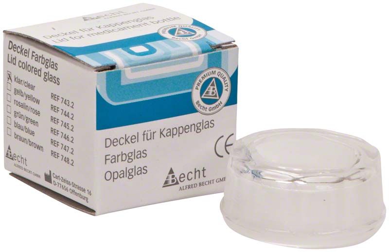 Klarer Kappenglasdeckel von Alfred Becht neben Verpackung mit Farbmarkierung.