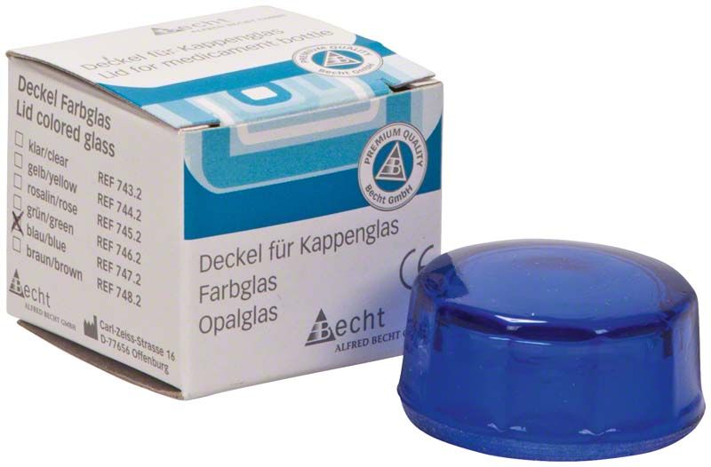 Kappenglasdeckel aus blauem Buntglas neben Verpackung mit Aufschrift.
