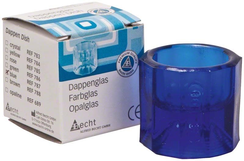 Dappenglas Buntglas blau mit zehneckiger Form neben Verpackung.