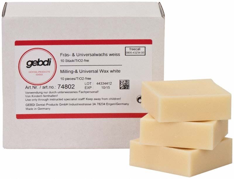 Fräs- und Universalwachsblöcke vor Verpackung mit Produktinformationen.