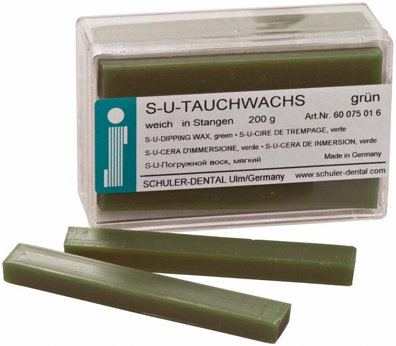 S-U-Tauchwachs grün in Stangenform mit Verpackungsetikett.