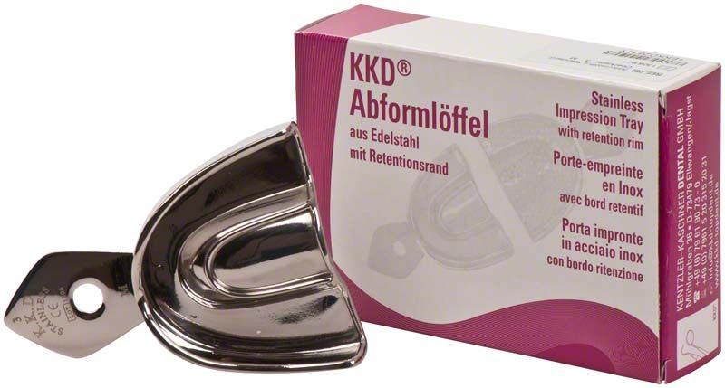 Abformlöffel aus Edelstahl mit Verpackung in Rosa und Weiß.