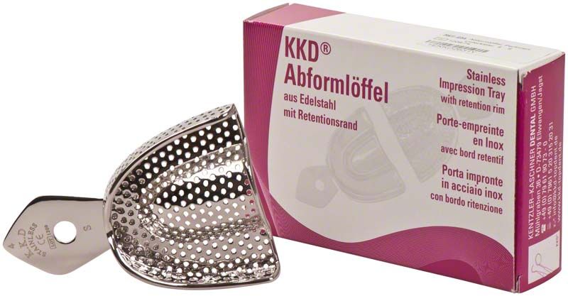 Abformlöffel perforiert aus Edelstahl neben Verpackung mit Aufdruck.