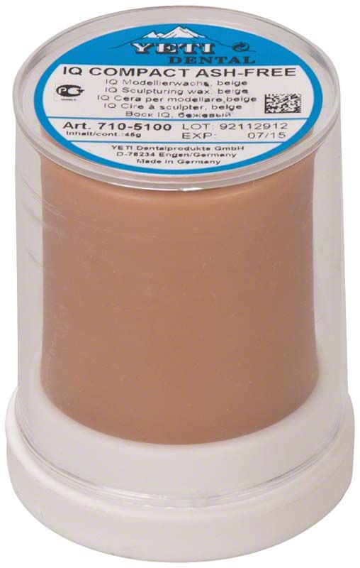 IQ Compact Wachs Zylinder in transparenter Verpackung mit blauem Etikett.