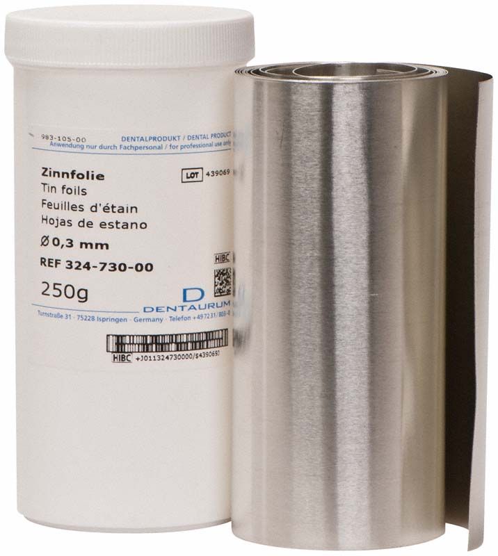 Bleifolie auf Rolle neben weißem Produktbehälter.