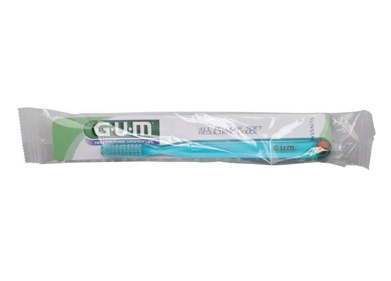 GUM® Classic Zahnbürste in Originalverpackung mit transparentem Kunststoff.