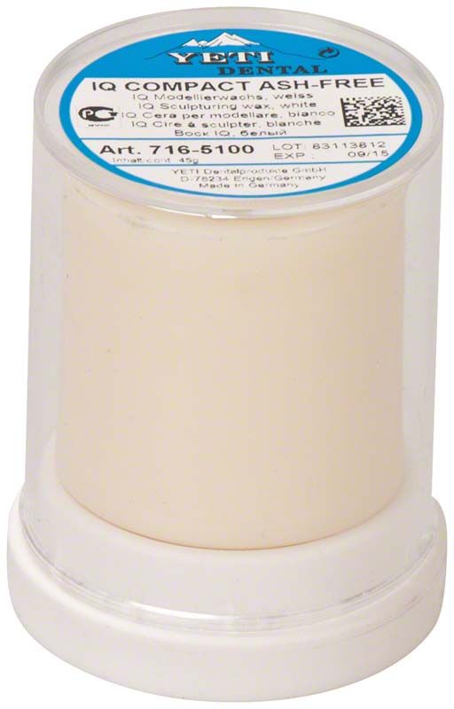 Zylinderförmiges IQ Compact Dentalwachs in weißer Verpackung von Yeti Dentalprodukte.
