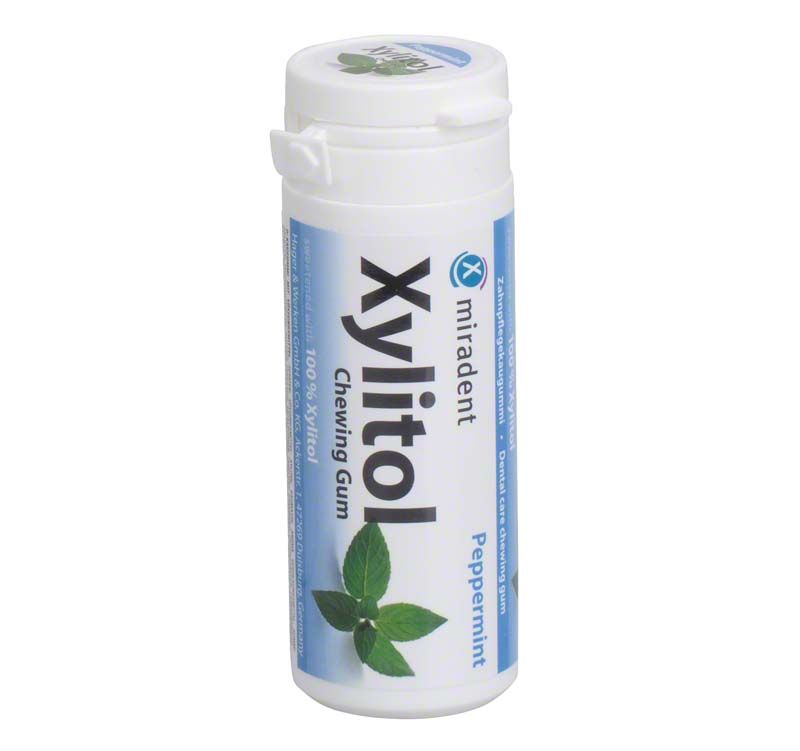 Xylitol Kaugummi Dose Pfefferminz mit blauem Etikett und Minzblatt-Abbildung.