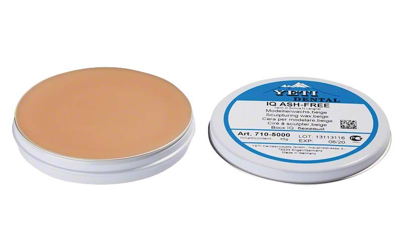 Beiges Dentalmodellierwachs in runder Metallverpackung mit Etikett.