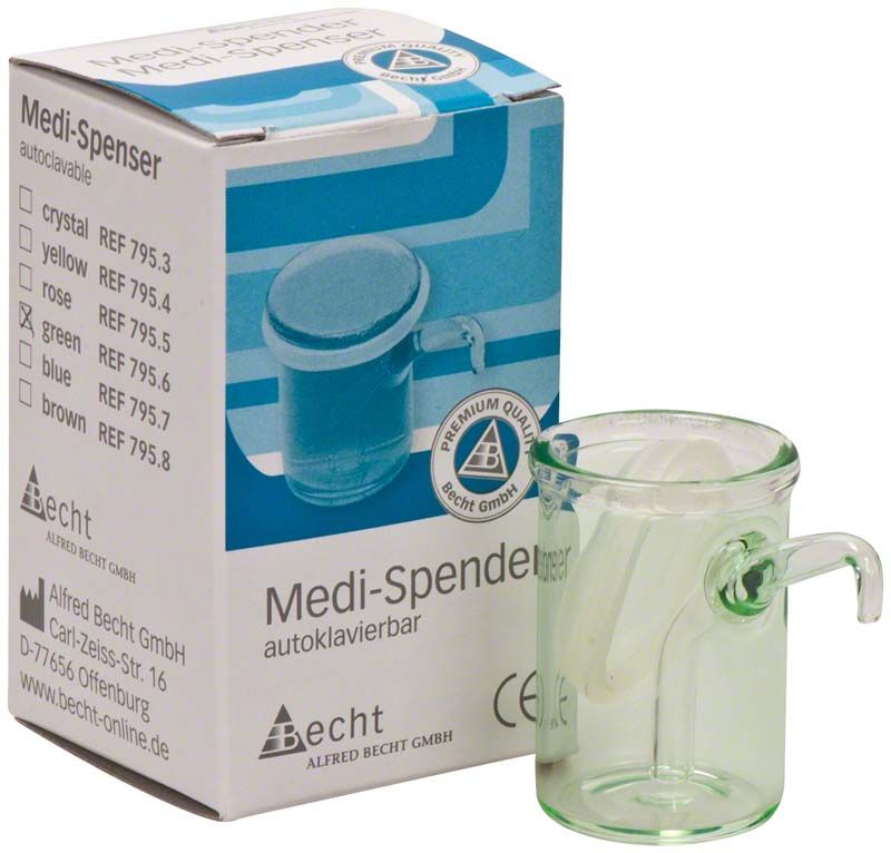 Medi-Spender-Gläschen grün neben Verpackung mit Produktinformationen.