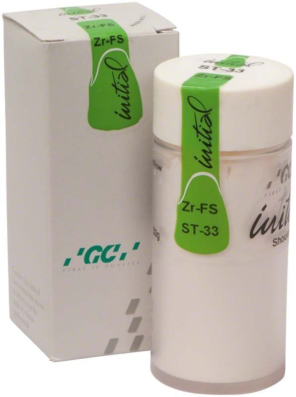 GC Initial Zr-FS Shoulder Transparent 50g Dose neben Verpackung mit grüner Aufschrift