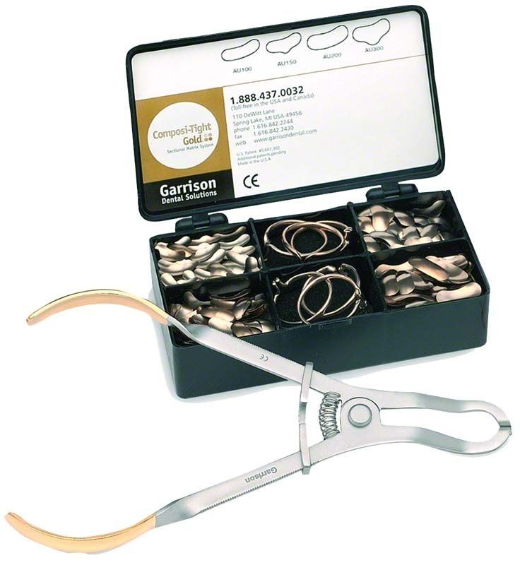 Composi-Tight Gold System-Set mit Matrizen und Spannzange in offenem Etui.