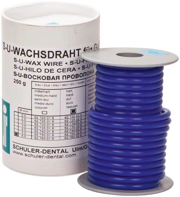 Blauer Wachsdraht auf Spule neben Verpackung mit Produktinformationen.