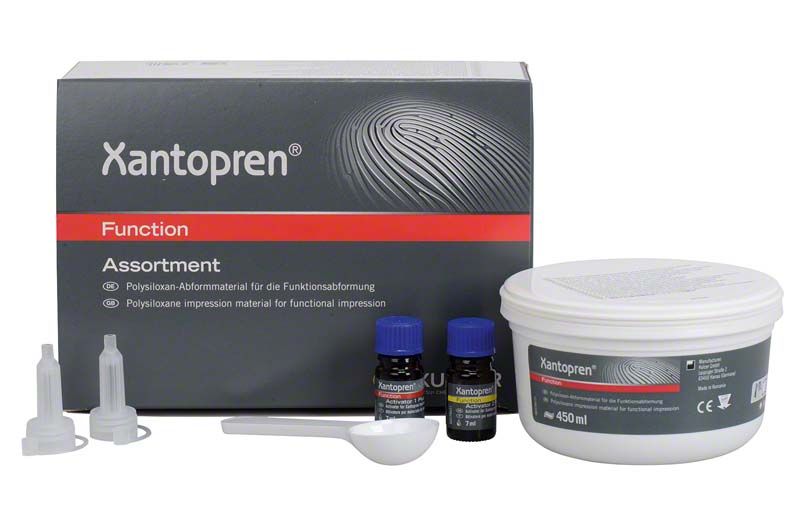 Xantopren Function Abformmaterial mit Zubehör und Verpackung.