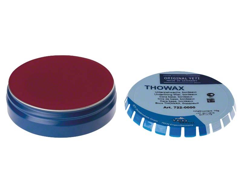 Thowax Unterziehwachs, bordeaux, in geöffneter Dose mit Produktetikett.