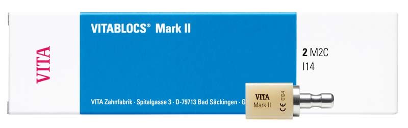 VITABLOCS® Mark II Rohling vor Verpackung mit VITA-Logo und Modellbezeichnung.