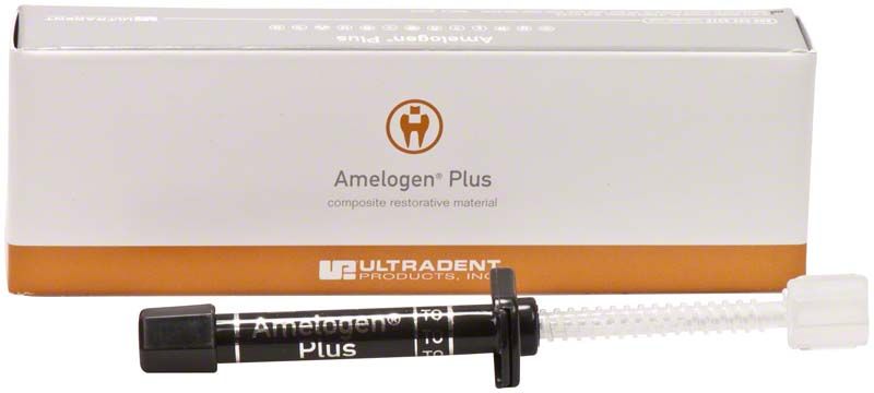 Amelogen Plus Spritze in Translucent Orange vor Verpackung.