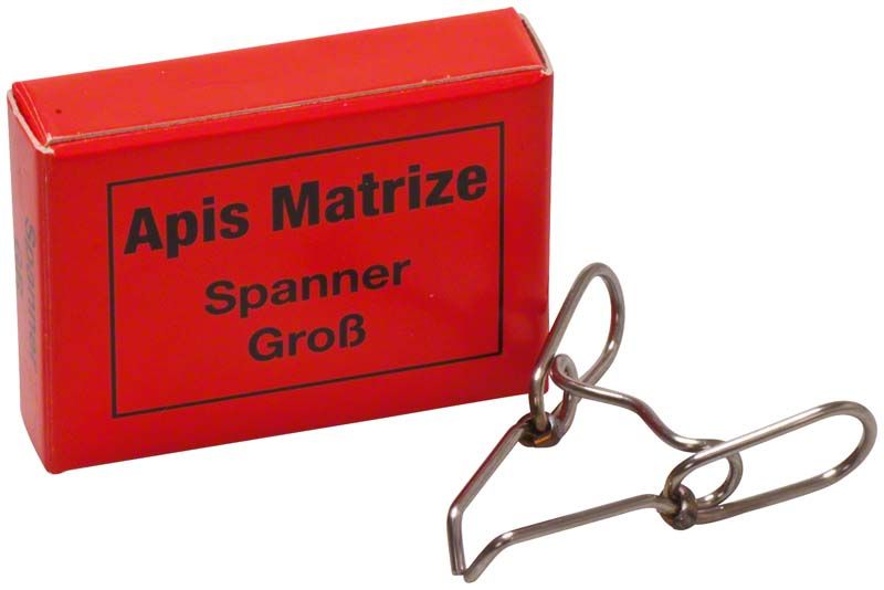 Roter Karton mit Aufschrift "Apis Matrize Spanner Groß" und Metallspanner.
