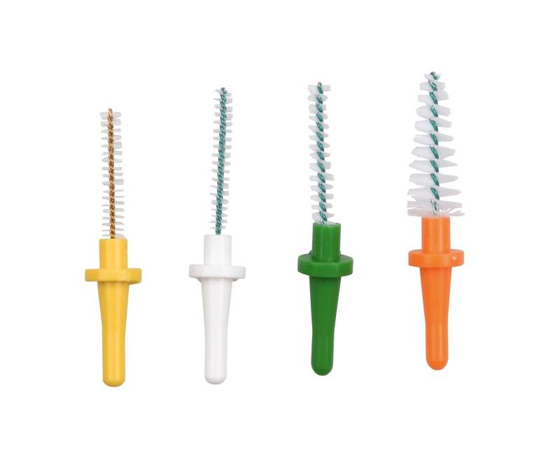 Vier Pic-Brush® Ersatzbürsten in verschiedenen Farben und Größen für die Interdentalreinigung.