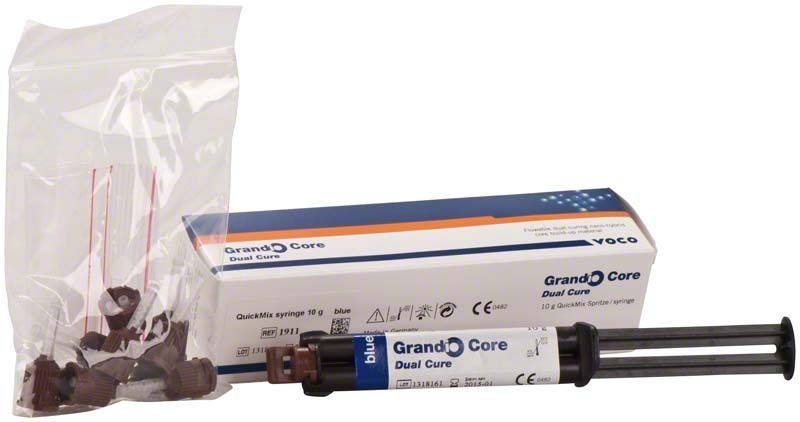 Grandio® Core Dual Cure Quickmix Spritze mit Verpackung und Zubehör.