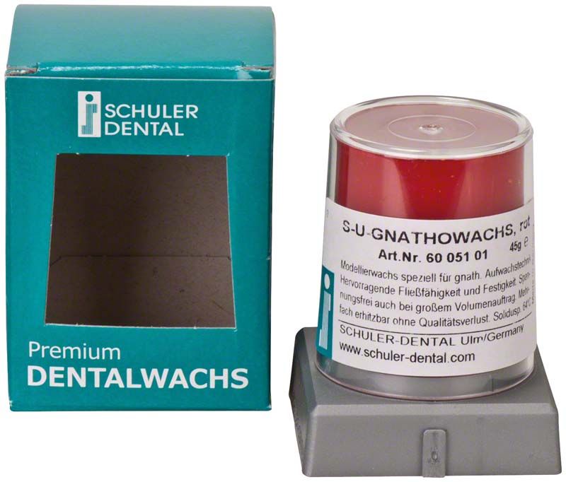 S-U-Gnathowachs rot neben Verpackung mit Schuler Dental Logo.