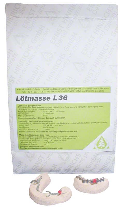 Lötmasse L 36® Verpackung mit Einbettmassen und Zahnprothesen-Modellen.