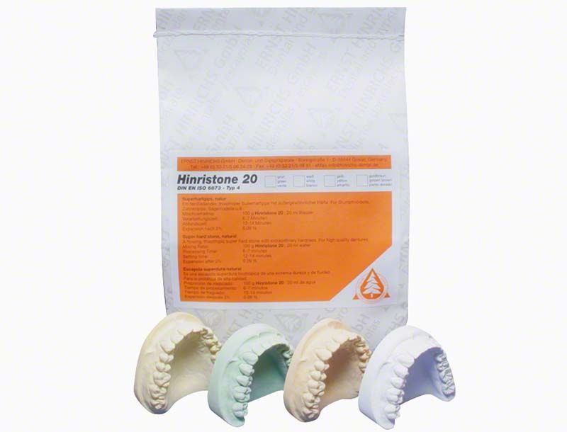 Hinristone® 20 goldbraun 5 kg Beutel mit dentalen Modellabdrücken.