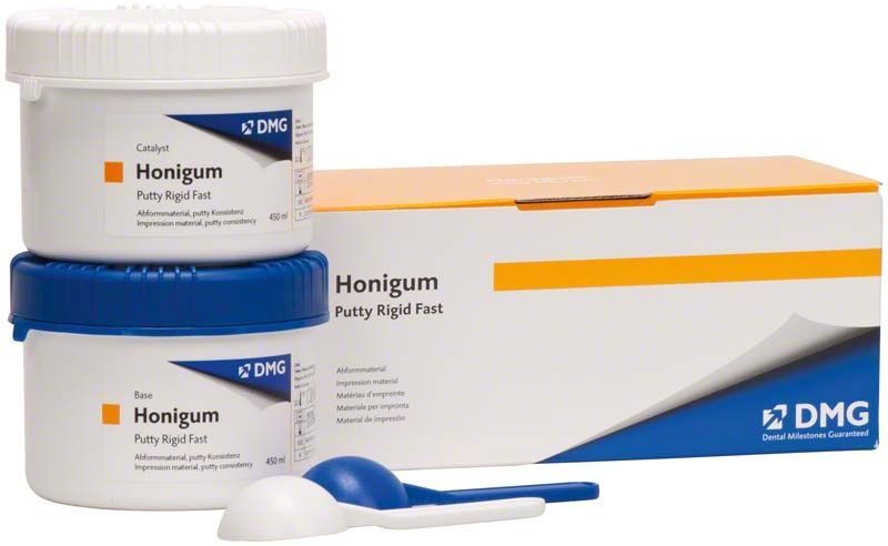 Honigum-Putty Rigid Fast Abformsilikon Dosen mit Spatel.