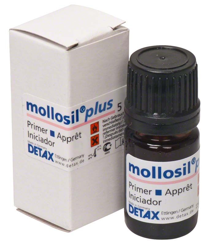 mollosil® plus Primer 5ml Fläschchen neben der Originalverpackung