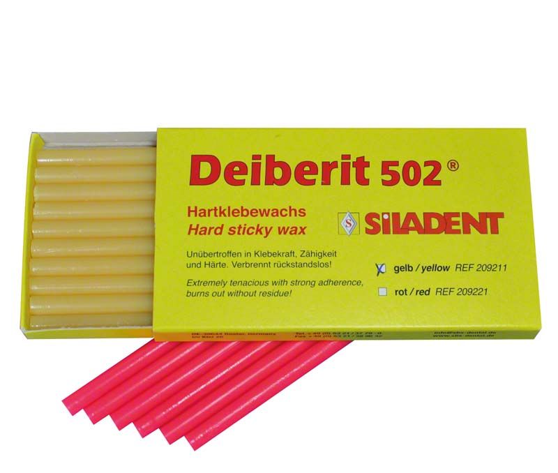 Gelbes Deiberit 502 Hartklebewachs von Siladent mit roten Wachsstäben.
