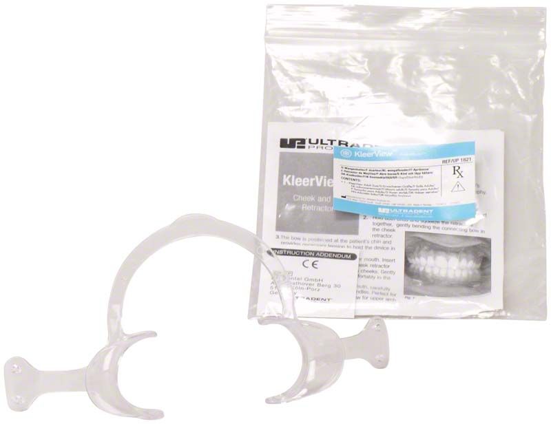 KleerView Lippenspreitzer mit Verpackung und Gebrauchsanweisung im Hintergrund.