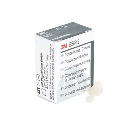 Polycarbonat-Kronen Eckzähne Nr. 34 von 3M neben der Verpackung.