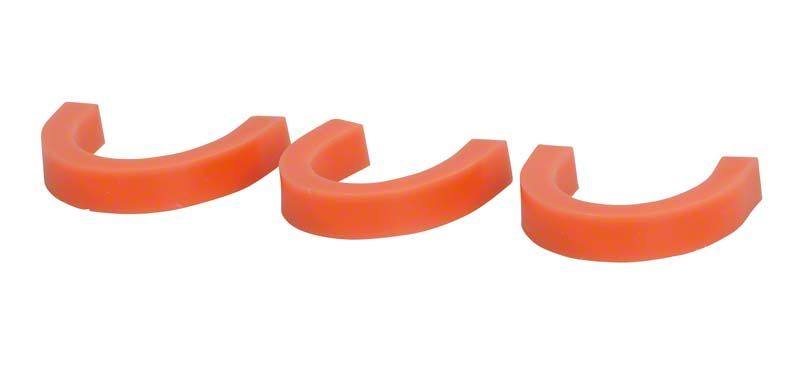 Drei orangefarbene Wachsbisswälle in U-Form für Zahnarztpraxis.