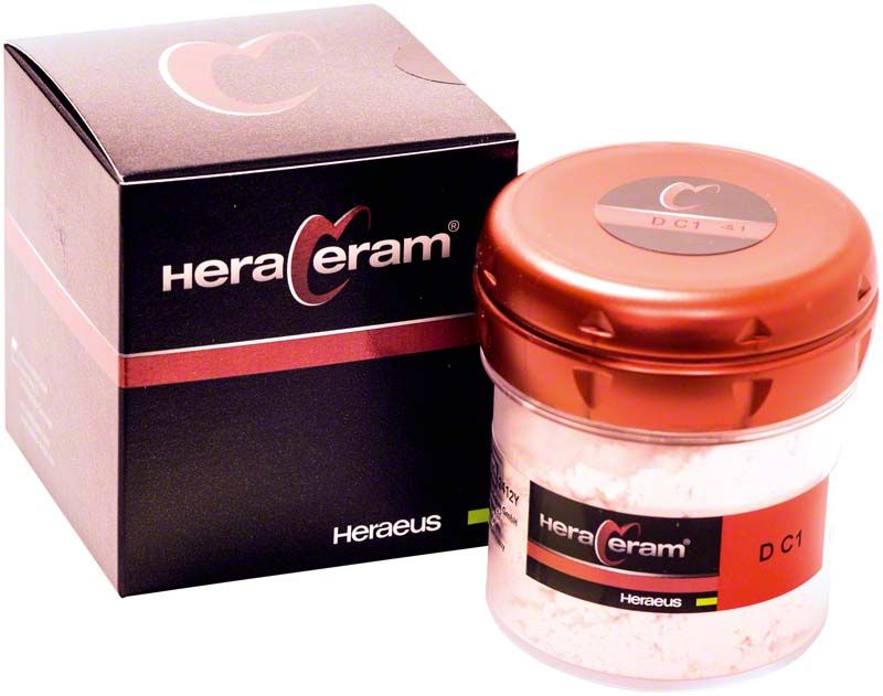 HeraCeram® Dentin 100g DC1 in rotem Behälter neben Originalverpackung.