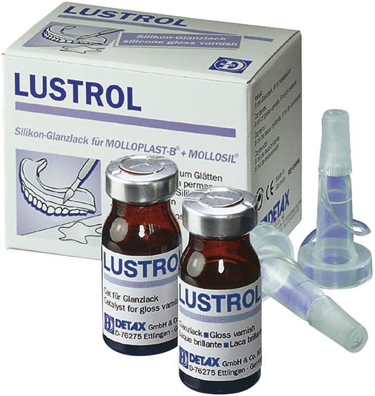 Lustrol Silikon-Glanzlack mit Flaschen und Applikatoren vor Verpackung.