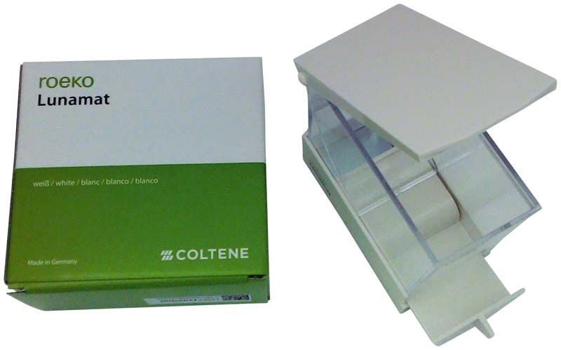 Lunamat Spender mit geöffneter Schublade und Verpackung von Coltene.