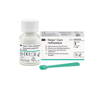 Ketac™ Cem radiopaque Pulverflasche und Verpackung mit Dosierlöffel.