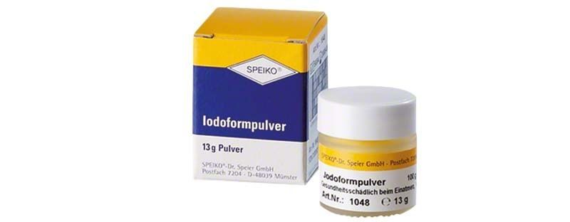 Jodoformpulver von Speiko mit Verpackung und Glasbehälter.