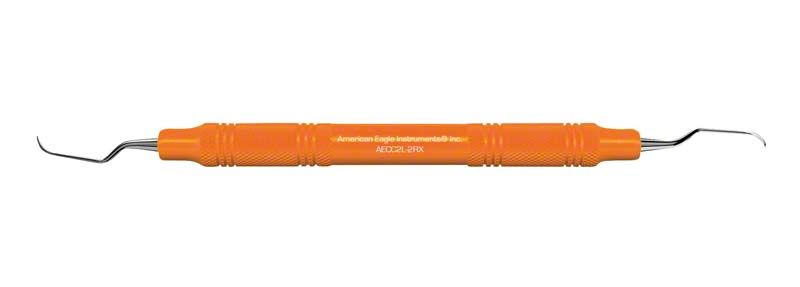 Orange Universalkürette mit ergonomischem Handgriff und feiner Stahlspitze.