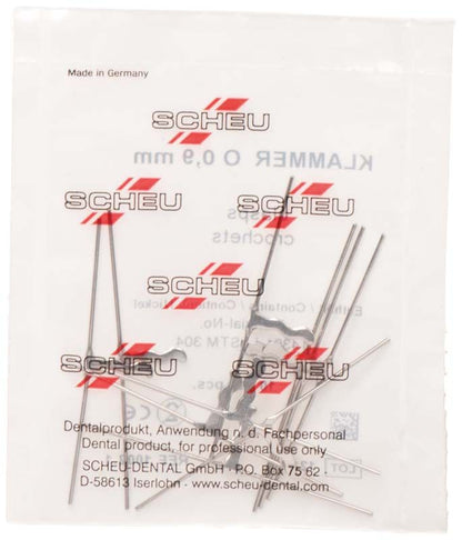 Kieferorthopädische Edelstahlklammern Ø 0,9mm, verpackt in transparenter Tüte.