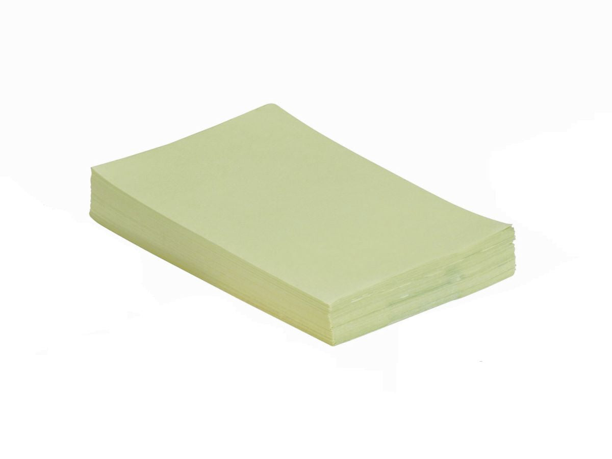 Grünes Monoart Traypapier für den dentalen Einsatz auf Instrumententabletts.