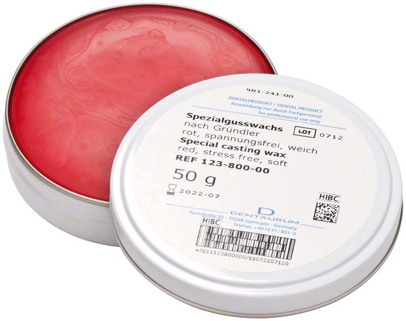 Rotes Spezialgusswachs in runder Metallverpackung mit Etikett.