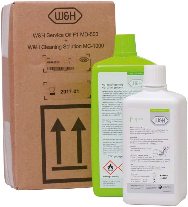 Reinigungs- und Pflegeset mit W&H Reinigungs- und Serviceölflaschen vor Kartonverpackung.