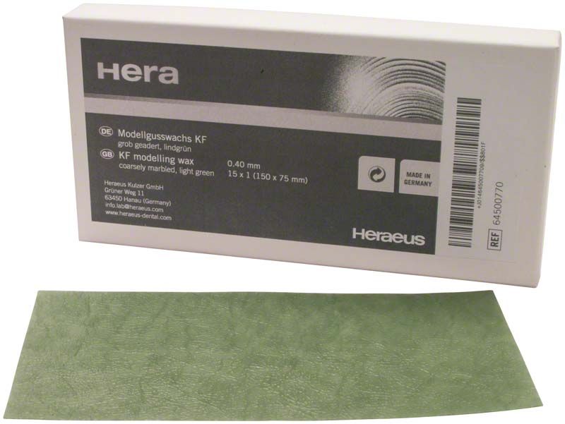 Grüne KF-Wachsplatte grob geadert, 0,4mm, neben Verpackung.