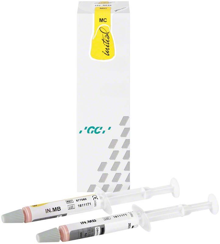 GC Initial INmetalbond Spritzen vor Verpackung mit gelbem Etikett.