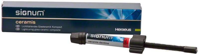 Signum® ceramis dentine DA2 in Spritze mit Verpackung im Hintergrund.