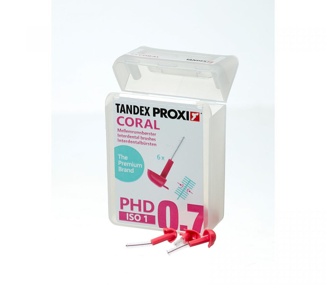 Interdentalbürsten Proxi pink micro fine in geöffneter Verpackung mit Schutzkappen.