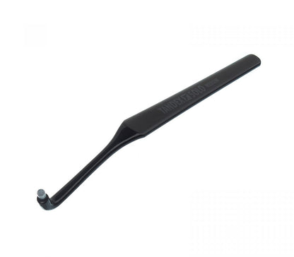 Einbüschelbürste Tandex Solo mit schwarzem, ergonomisch abgewinkeltem Griff.