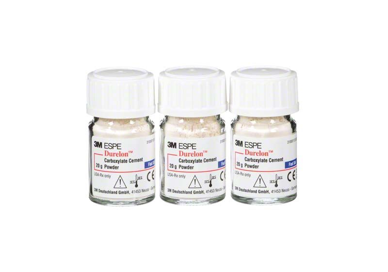 Drei Fläschchen 3M Durelon Carboxylat-Befestigungszement mit weißem Pulver.